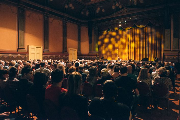 Fremantle Town Hall full of people enjoying a comedy show